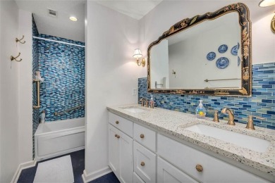 Architecturally stunning unit in the iconic Village Plaza! Built