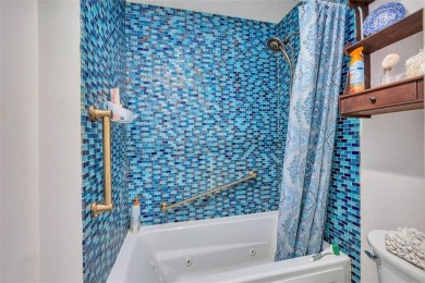 Architecturally stunning unit in the iconic Village Plaza! Built