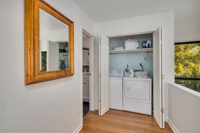 Architecturally stunning unit in the iconic Village Plaza! Built