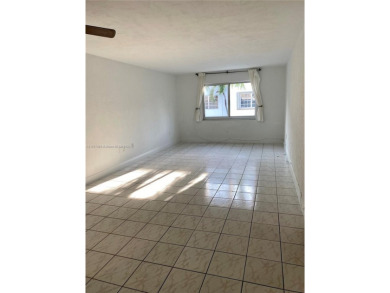 Corner unit with updated bathrooms, ceramic floors with new