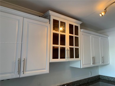 Corner unit with updated bathrooms, ceramic floors with new