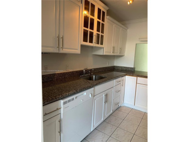 Corner unit with updated bathrooms, ceramic floors with new