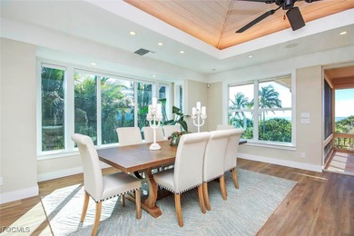 Step into a world of refined coastal living! A rare opportunity