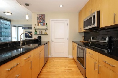 Welcome to this stunning 11th-floor 2 bed, 2 bath condo with