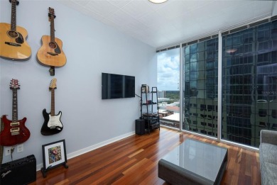 Welcome to this stunning 11th-floor 2 bed, 2 bath condo with