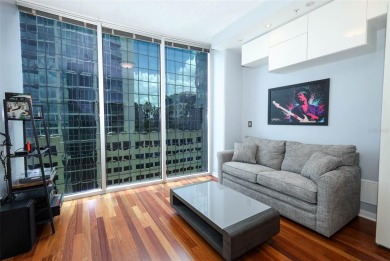 Welcome to this stunning 11th-floor 2 bed, 2 bath condo with