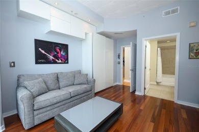 Welcome to this stunning 11th-floor 2 bed, 2 bath condo with