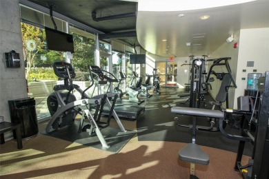 Welcome to this stunning 11th-floor 2 bed, 2 bath condo with