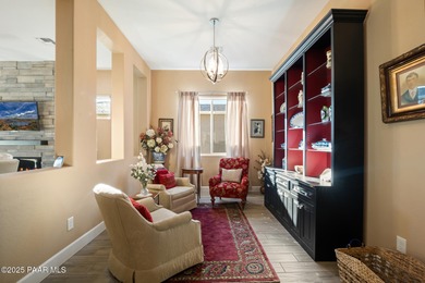 Set in the desirable Quailwood community, this impressive home