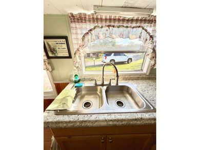 CHECK OUT THIS TURN-KEY 2-BEDROOM, 2-BATHROOM HOME ON AN