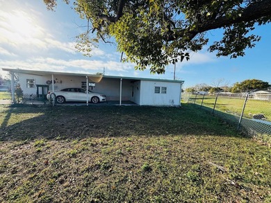 CHECK OUT THIS TURN-KEY 2-BEDROOM, 2-BATHROOM HOME ON AN