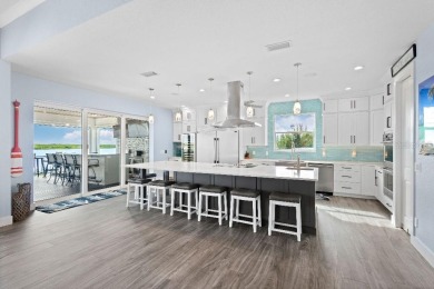 PRIME LOCATION! Presenting this stunning, Key West Style