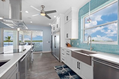 PRIME LOCATION! Presenting this stunning, Key West Style