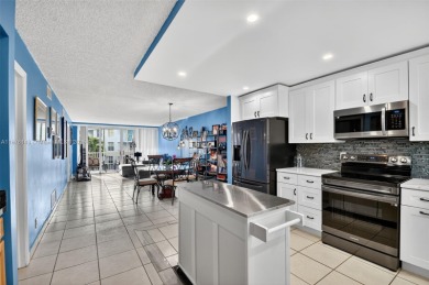 PRICE IMPROVEMENT! Enjoy South Florida living in this charming