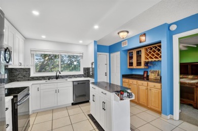 PRICE IMPROVEMENT! Enjoy South Florida living in this charming