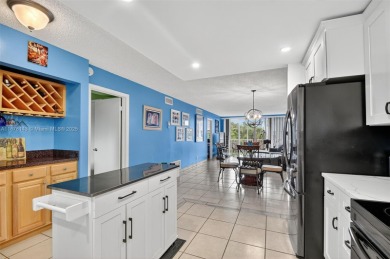 PRICE IMPROVEMENT! Enjoy South Florida living in this charming