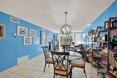PRICE IMPROVEMENT! Enjoy South Florida living in this charming