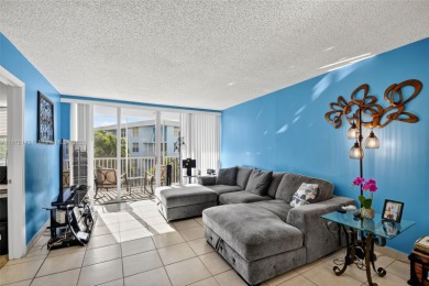 PRICE IMPROVEMENT! Enjoy South Florida living in this charming
