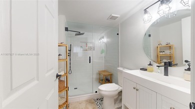 Immaculate 1st-floor unit in HOPA verified 55+ community. This