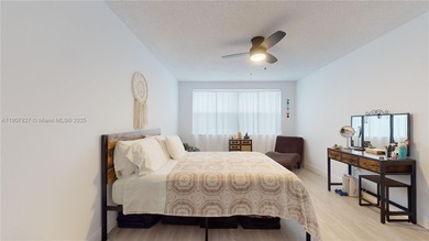 Immaculate 1st-floor unit in HOPA verified 55+ community. This