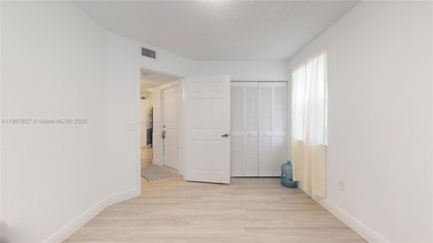 Immaculate 1st-floor unit in HOPA verified 55+ community. This
