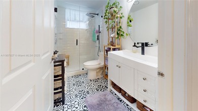 Immaculate 1st-floor unit in HOPA verified 55+ community. This