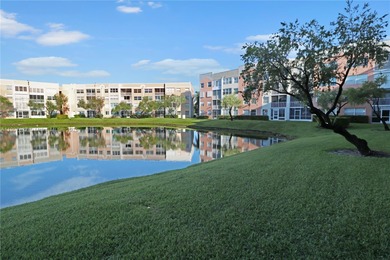 Immaculate 1st-floor unit in HOPA verified 55+ community. This