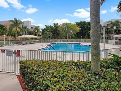 Immaculate 1st-floor unit in HOPA verified 55+ community. This