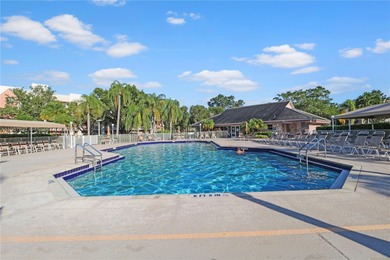 Immaculate 1st-floor unit in HOPA verified 55+ community. This