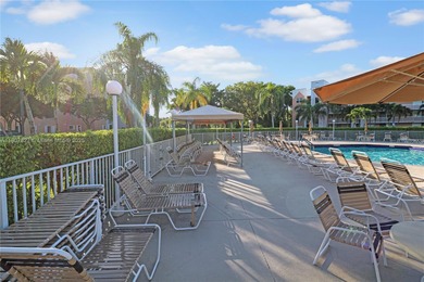 Immaculate 1st-floor unit in HOPA verified 55+ community. This