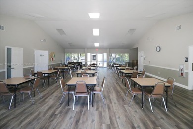 Immaculate 1st-floor unit in HOPA verified 55+ community. This