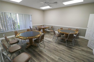 Immaculate 1st-floor unit in HOPA verified 55+ community. This