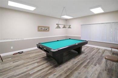 Immaculate 1st-floor unit in HOPA verified 55+ community. This