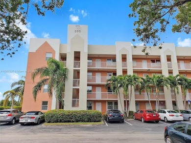 Immaculate 1st-floor unit in HOPA verified 55+ community. This