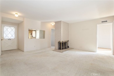 This beautiful home is nestled on a picturesque tree lined