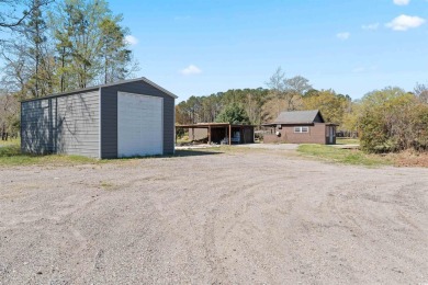 PLEASE NOTE: THIS LISTING IS FOR THE HOUSE SITTING ON ONE ACRE