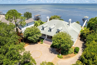 Timeless elegance on the bay behind the gates of prestigious