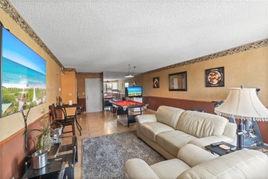 Step into luxury with this elegant condo in a quiet, gated