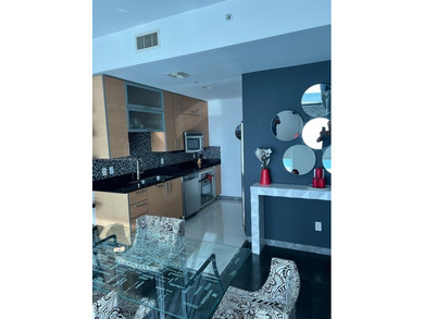 This one-bedroom residence, ideally located in the heart of