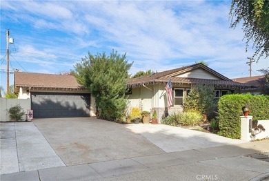 Spectacular single-level split-wing home featuring 4 bedrooms