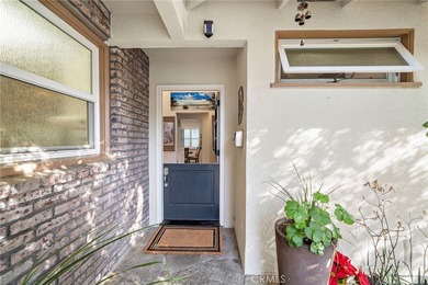 Spectacular single-level split-wing home featuring 4 bedrooms