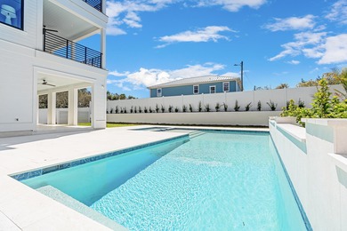 PRICED TO SELL NEW CONSTRUCTION! GULF VIEW GOODNESS ON THIS WEST