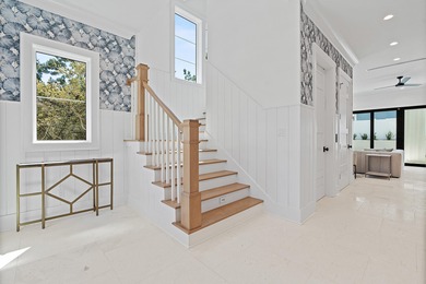 PRICED TO SELL NEW CONSTRUCTION! GULF VIEW GOODNESS ON THIS WEST