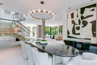 Welcome to CASA GRANDE, a dramatic 7BD/7BA modern residence