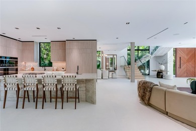 Welcome to CASA GRANDE, a dramatic 7BD/7BA modern residence