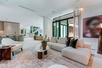 Welcome to CASA GRANDE, a dramatic 7BD/7BA modern residence