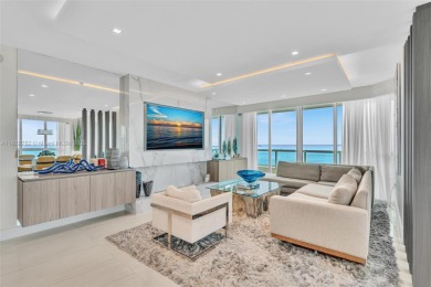 Live above the sand in Residence 1201 at Las Olas Beach Club --