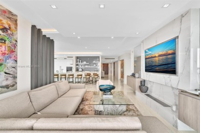 Live above the sand in Residence 1201 at Las Olas Beach Club --