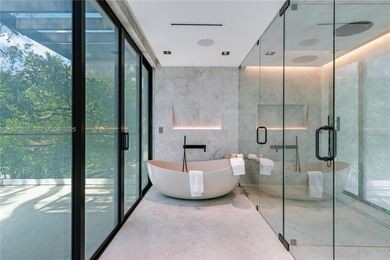 Welcome to CASA GRANDE, a dramatic 7BD/7BA modern residence