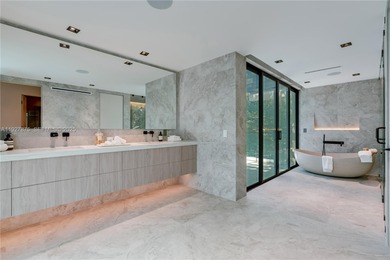 Welcome to CASA GRANDE, a dramatic 7BD/7BA modern residence